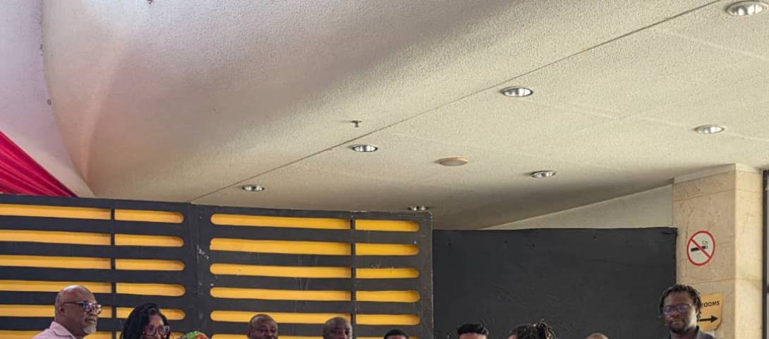 Board Members of National Theatre displaying copies of the document